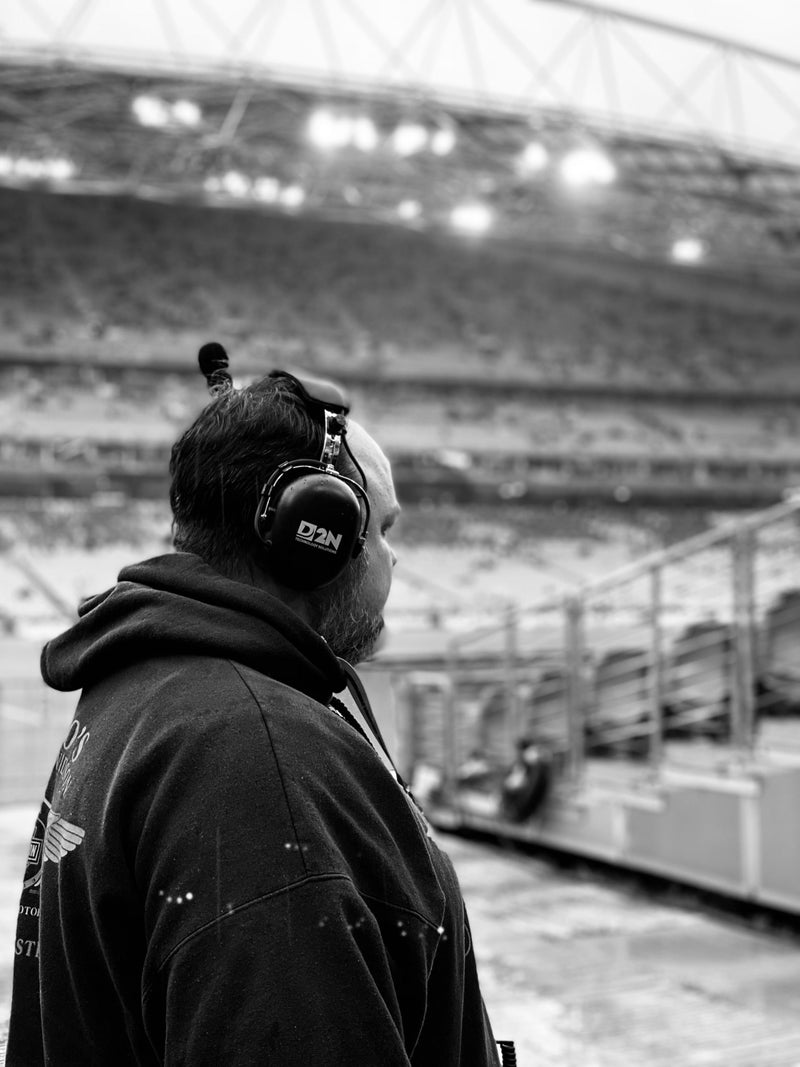 D2N crew member at the track